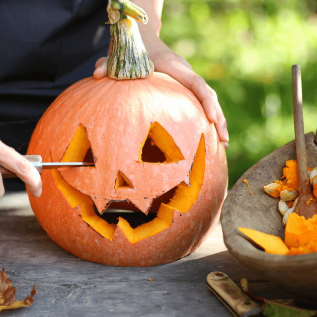 A Jack-O'Lantern being carved