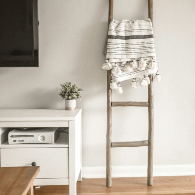a wooden ladder for storage space