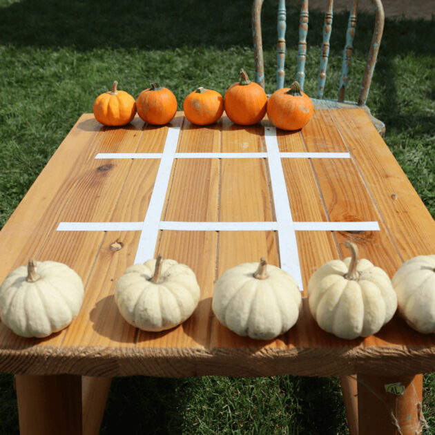 A pumpkin themed tic tac toe game for new thanksgiving traditions