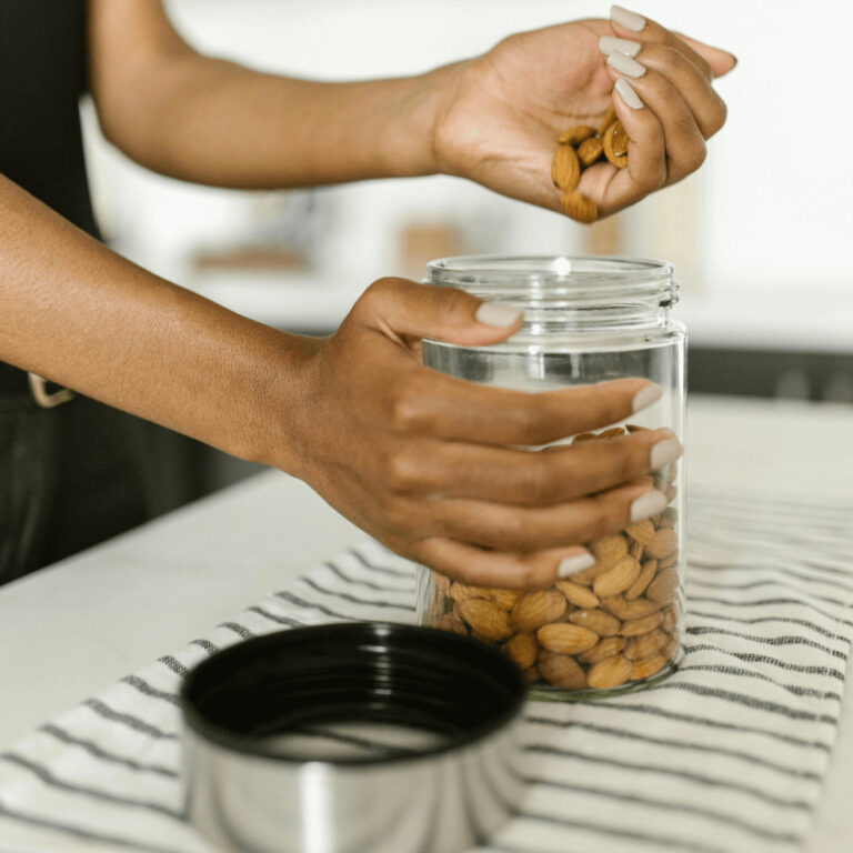 A woman organizing her pantry