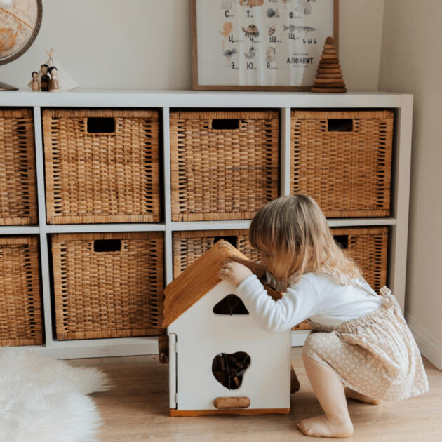 toy storage shelves in living room