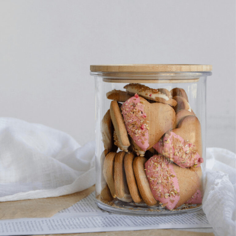 simple sugar cookie Valentine's cookies decorated with icing and rose petals