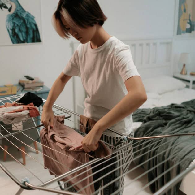 woman organizing workout clothes