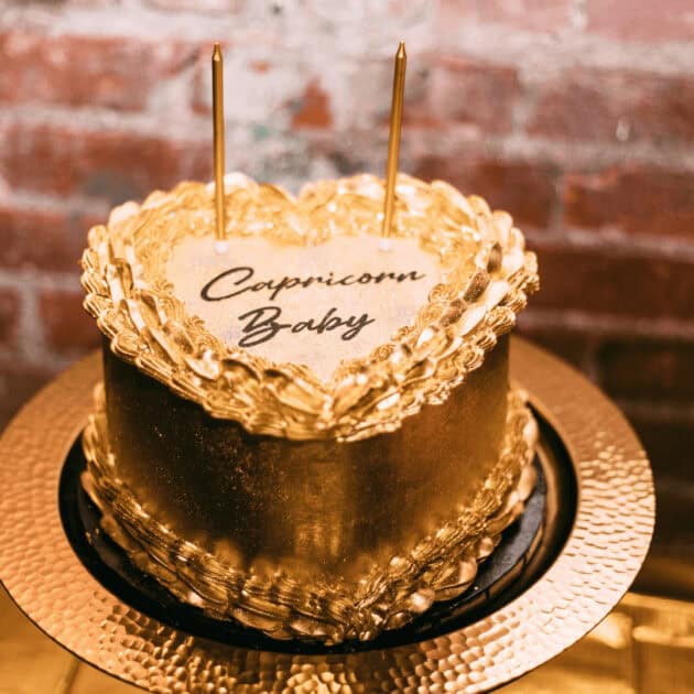 gold horoscope birthday cake