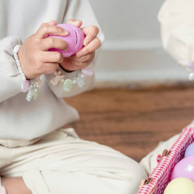 girl opening an Easter egg
