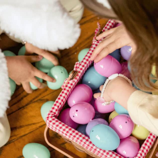 girls playing in Easter basket