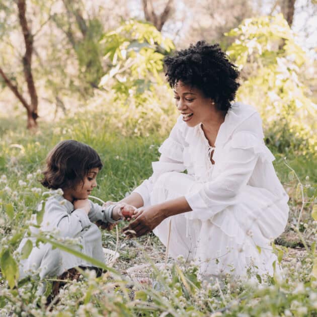 girl and mom on an Easter egg hunt