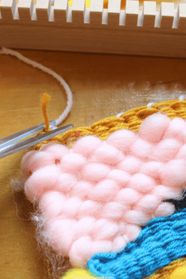 cutting tails off potholder