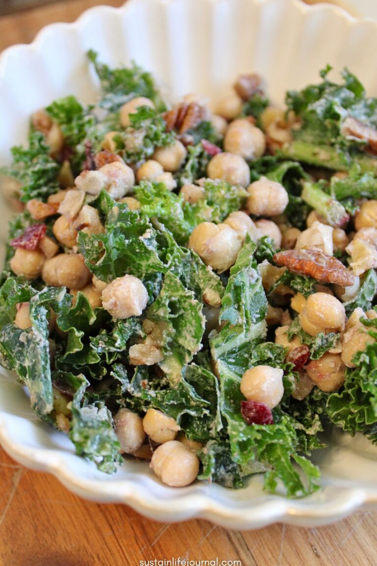 vegan kale salad with chickpeas, cranberries and tahini dressing
