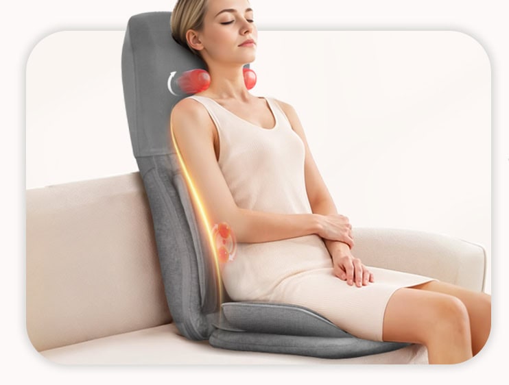 Woman using a massage chair with neck support.