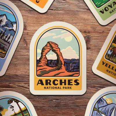 Arches National Park sticker on wooden table
