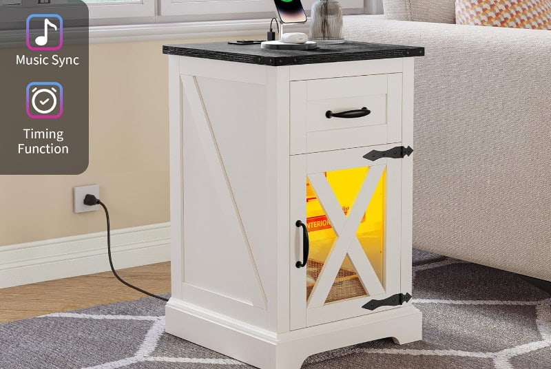 White side table with lamp and storage space.