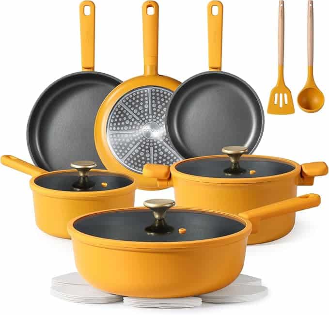 Yellow cookware set including pots, pans, utensils