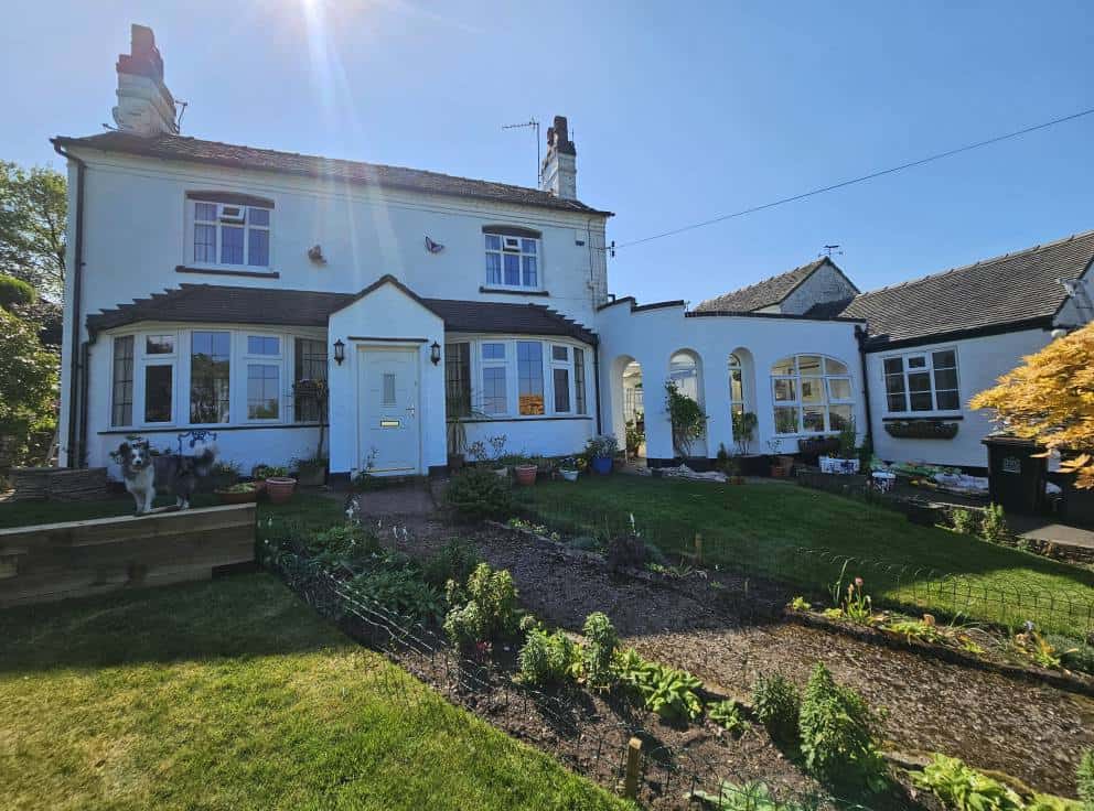 Victorian house exterior painted by professional decorators, showcasing quality craftsmanship and vi.