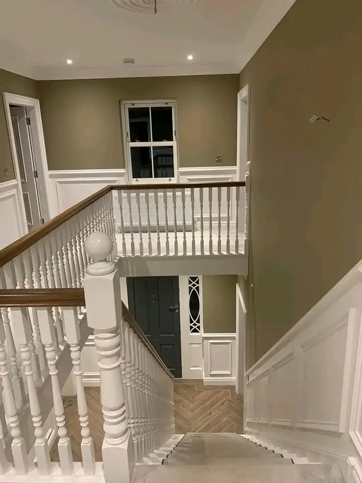 Interior staircase painted with high-quality finishes by SWS Painters & Decorators.