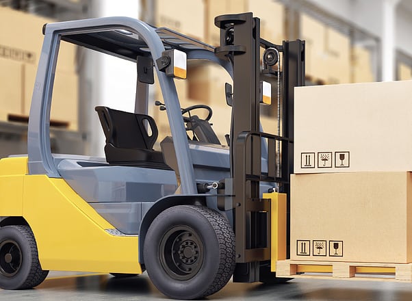 forklift lifting boxes in a warehouse