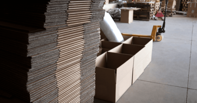 stack of flat boxes in a warehouse