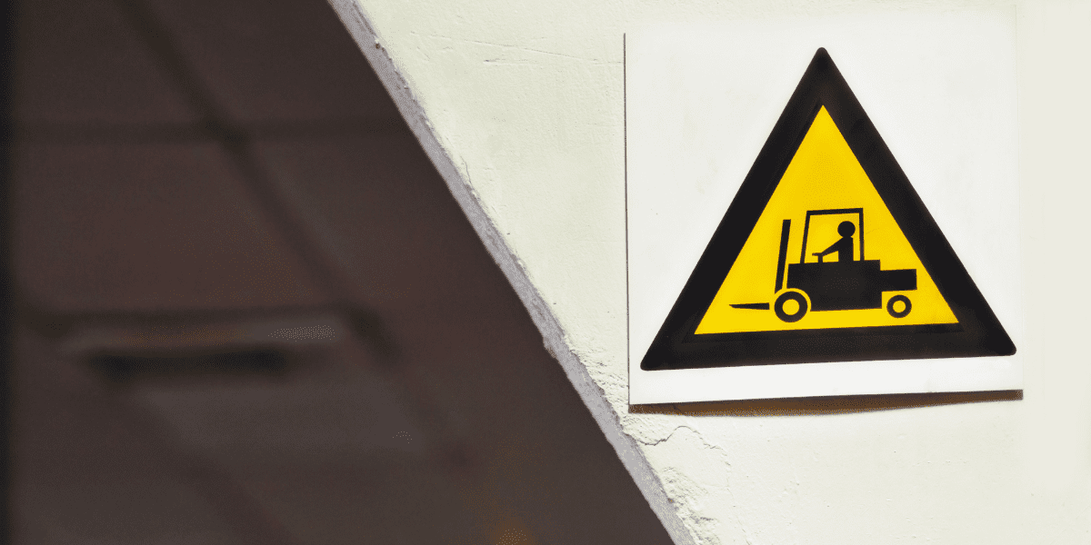 forklift warning sign on a wall