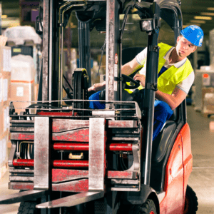 forklift driver leaning out of lift truck to see what he hit