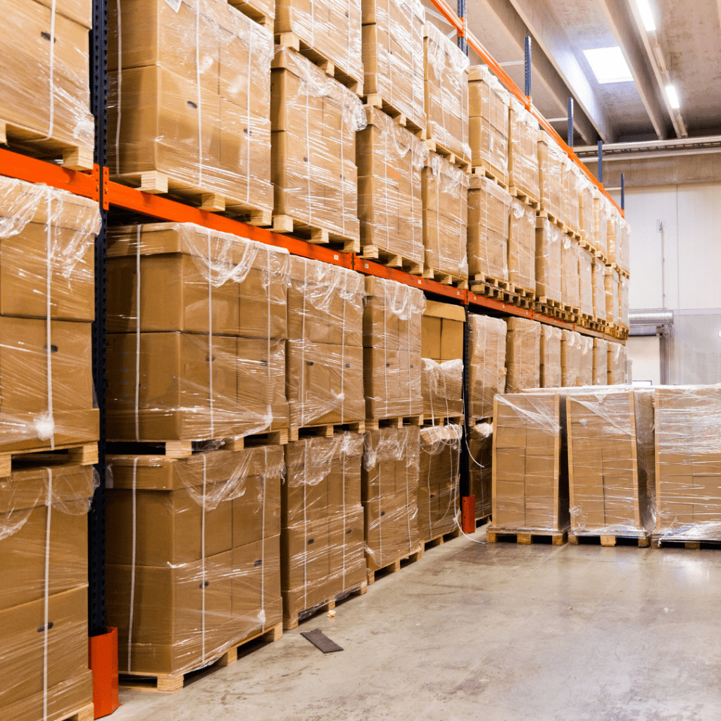 Boxes in warehouse stacked up to 20 feet tall