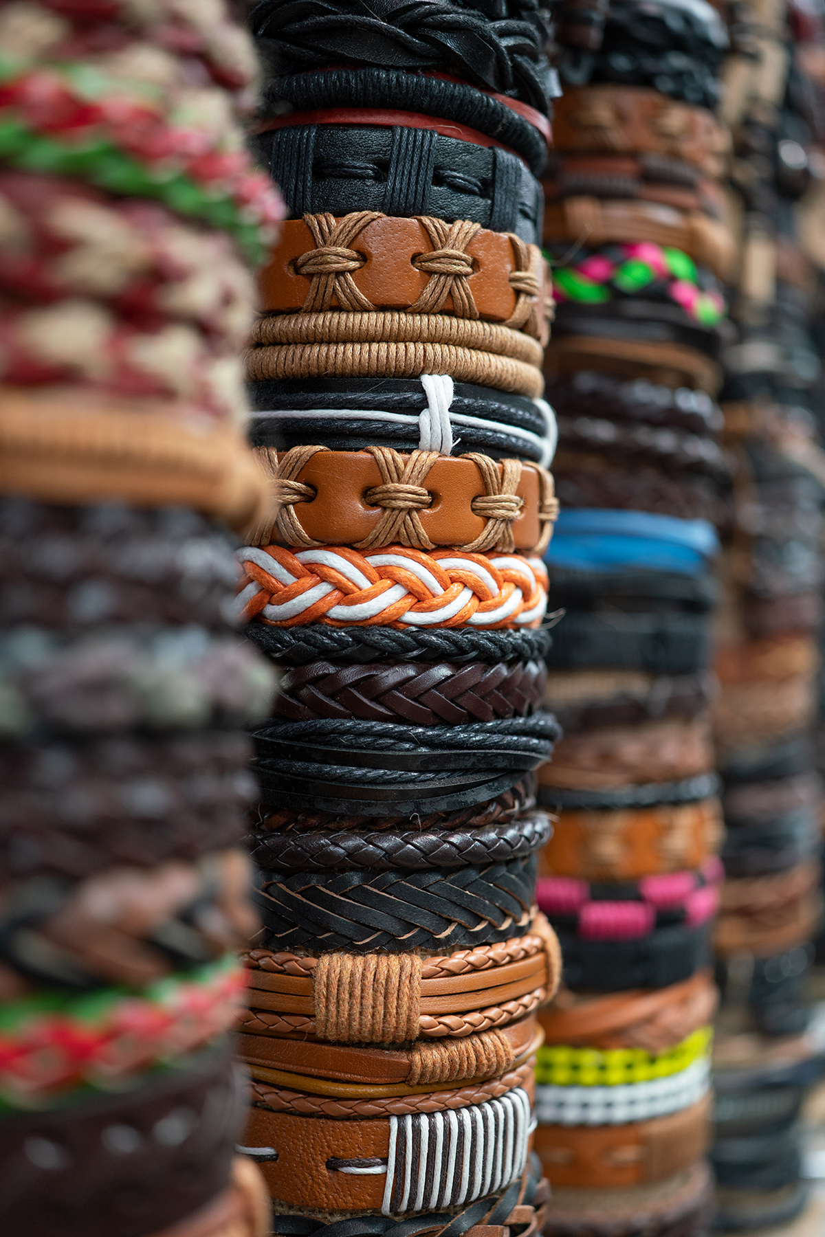 A close-up image of stacked leather bracelets showcasing texture, color, and pattern&mdash;demonstrating how to photograph close-up images with detail and depth. &copy;Glynn Lavender