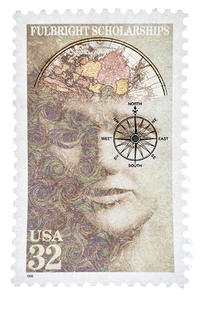A high-resolution image of a USA 32-cent Fulbright Scholarships postage stamp featuring a woman's face blended with a map and compass design&mdash;an example used to demonstrate how to photograph stamps with clarity, depth, and detail. &copy;Jillian Bell