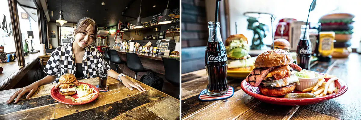 Close-up of juicy burgers and fries at Ramble Burger with BMX rider enjoying meal inside restaurant.