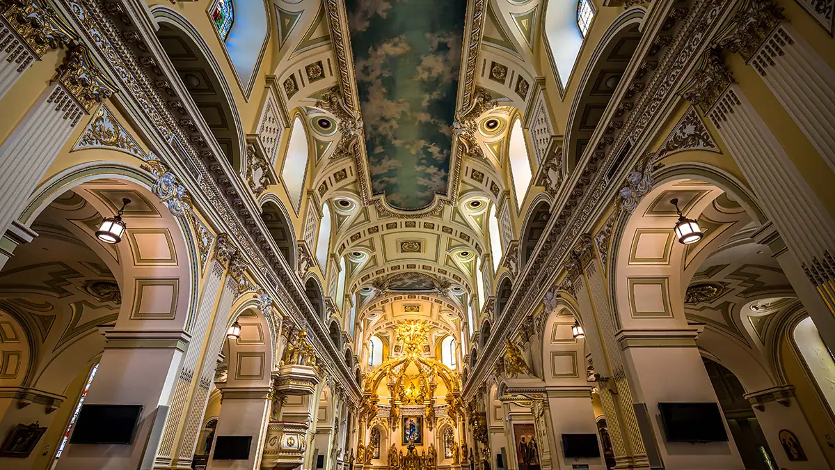 Grand church interior captured with the Tamron 16-30mm F/2.8 Di III VXD G2 ultra-wide-angle lens, ideal for travel and architecture photography with sharp detail and dramatic perspective.