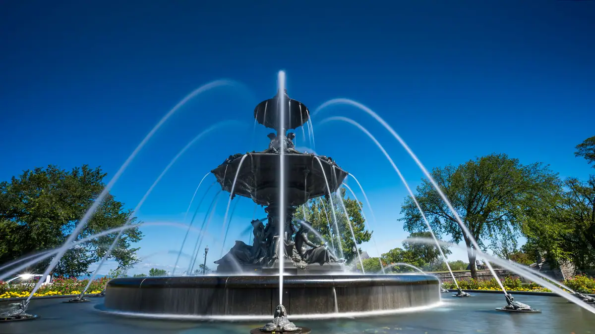 Fountain captured in daylight with the Tamron 16-30mm F/2.8 Di III VXD G2 wide angle lens, demonstrating motion blur with an ND filter—perfect for travel and architecture photography.