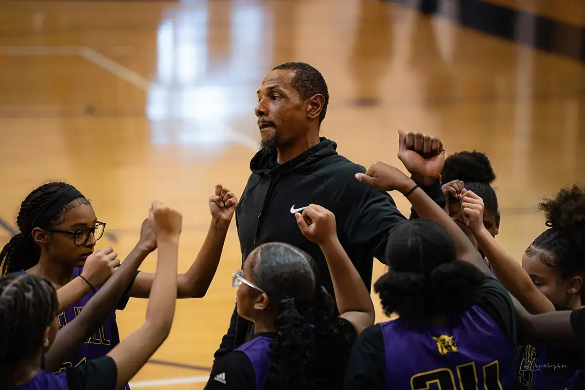 A coach and his players.