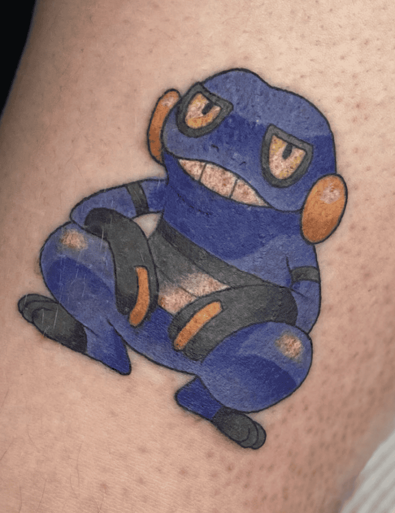 Brock’s Croagunk Sit Pokémon Anime Tattoo