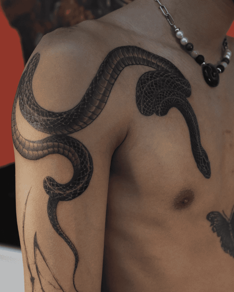 Black Kingsnake Coil Tattoo