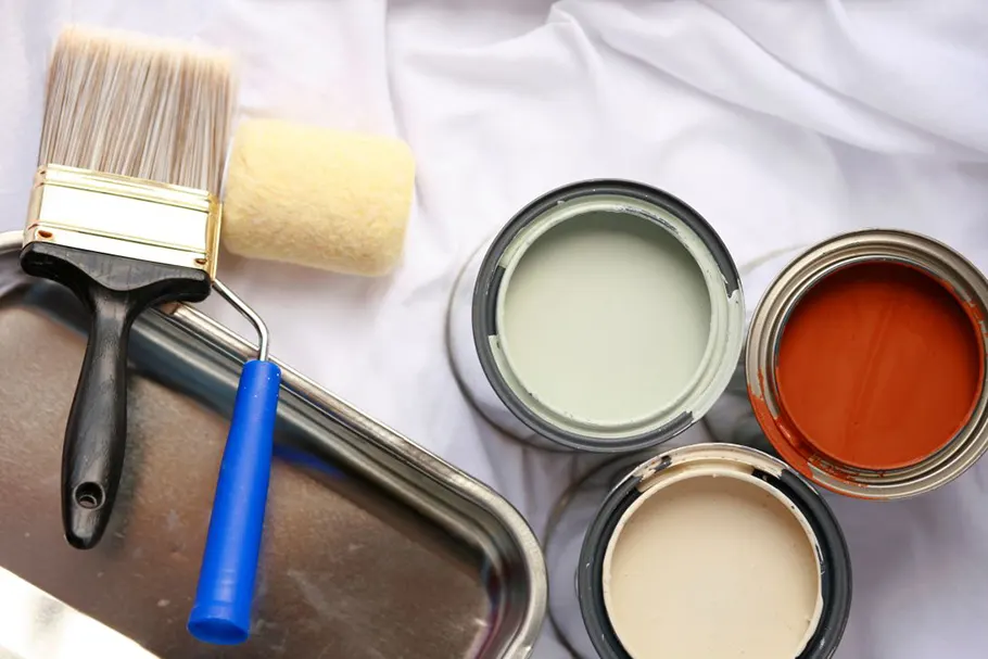 Paint pots and brushes Photo of Spray Foam Insulation on Floor