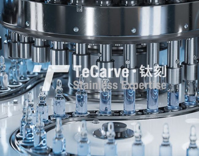 Automated stainless steel ampoule filling line with TeCarve branding