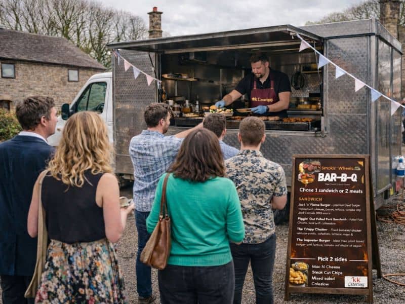 Smokin Wheels BBQ van at a wedding with guests queuing for food.