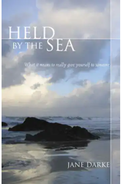 Book cover for 'Held by the Sea' by Jane Darke with ocean and sky background.