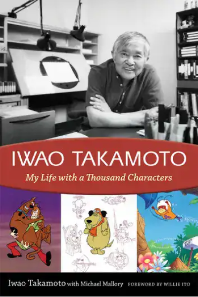 Portrait of Iwao Takamoto in his studio with character sketches and artwork.