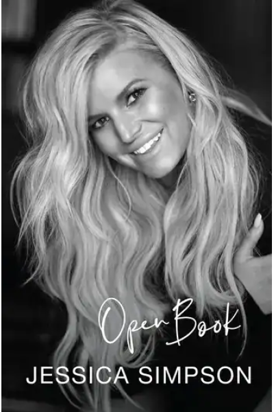 Jessica Simpson smiling with long wavy hair for Open Book.