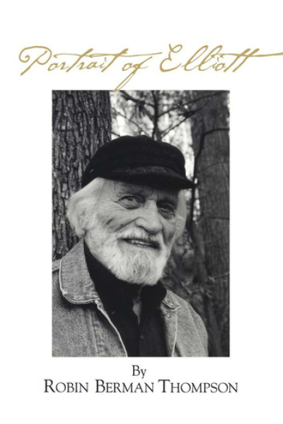 Black and white portrait of Elliott Thompson with a beard and cap in a forest setting.