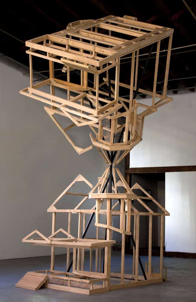 Sculptural wooden framework resembling a modern art installation.