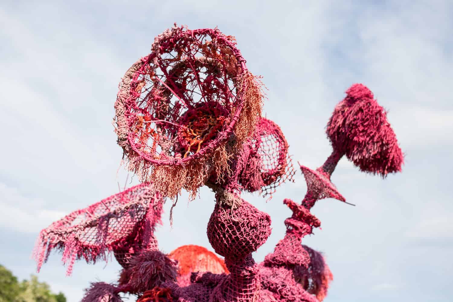 Pink floral sculpture, intricate design, outdoor art installation, TEMPOart.
