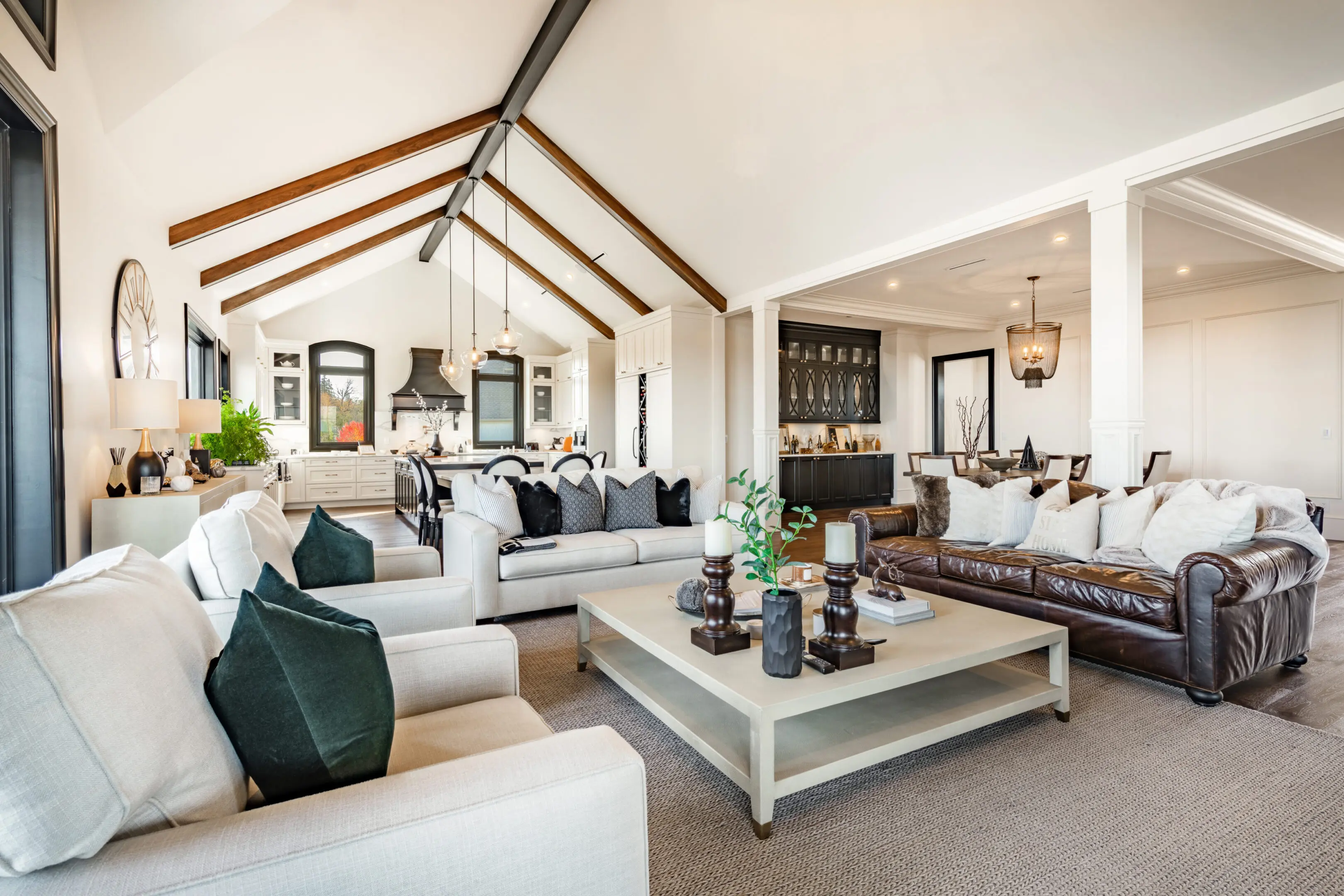 High-quality living room interior with vaulted ceilings and elegant furniture.