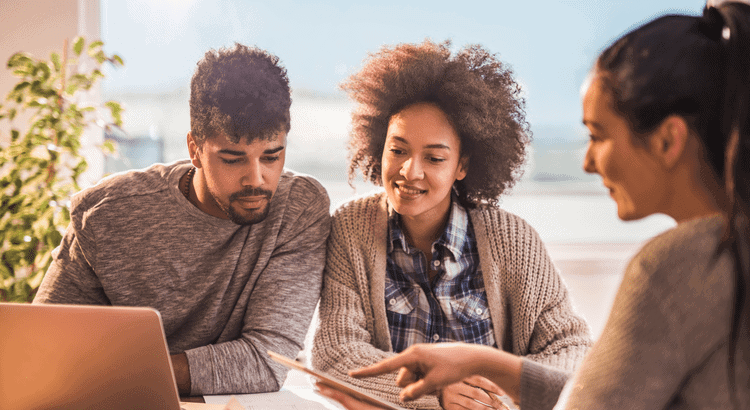 Friendly real estate agents collaborating at The Almaro Team in Walnut Creek, CA.