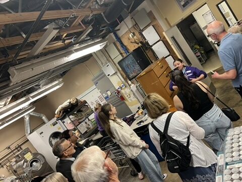 Team of real estate professionals at The Almaro Team in Walnut Creek, CA, engaging with clients and colleagues.