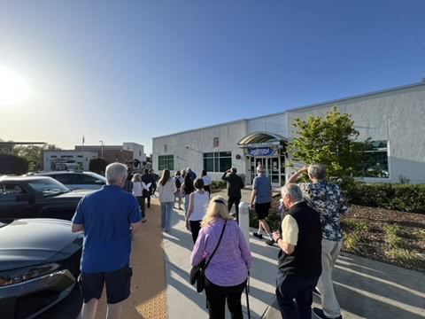 A group of people waiting outside The Almaro Team office in Walnut Creek, CA.