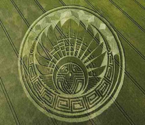 Mayan calendar symbol carved into the ground, showcasing intricate geometric patterns.