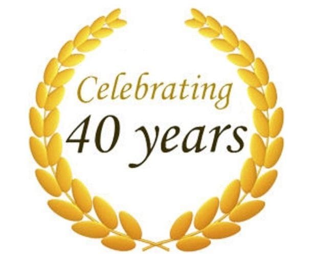 40th anniversary celebration logo with gold laurel wreath and elegant text.