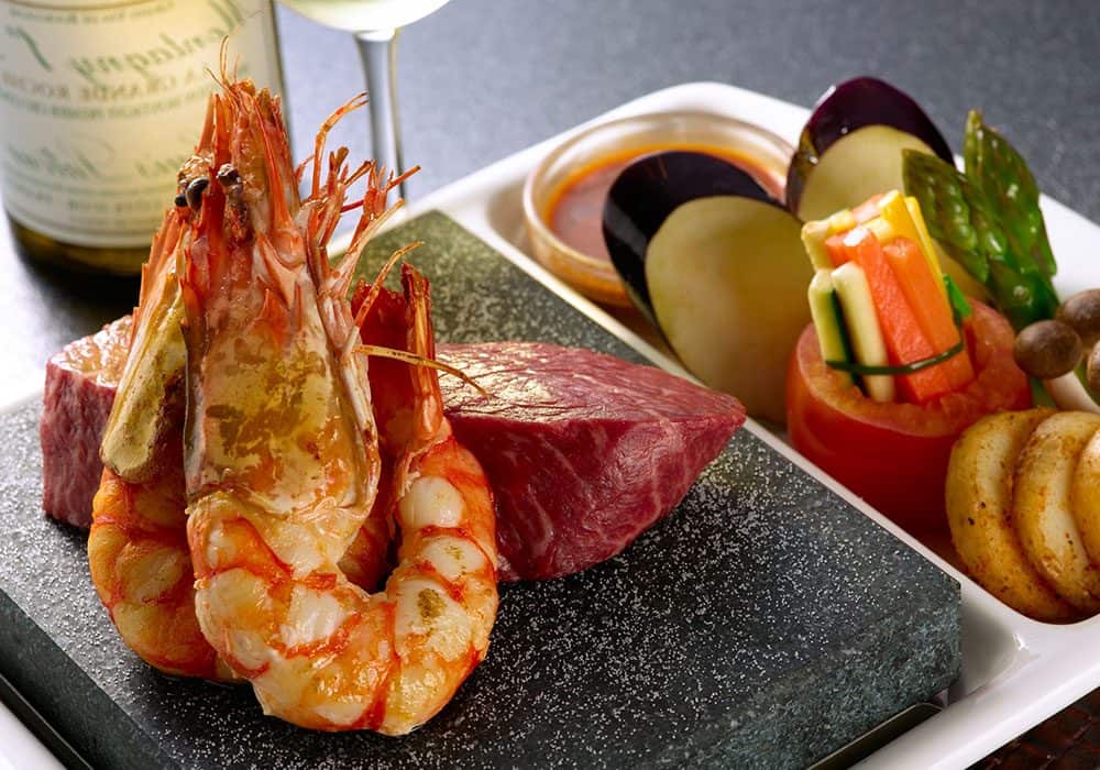 Succulent seafood and prime steak served at The Flames Galore Restaurant, perfect for a flavorful dining experience.