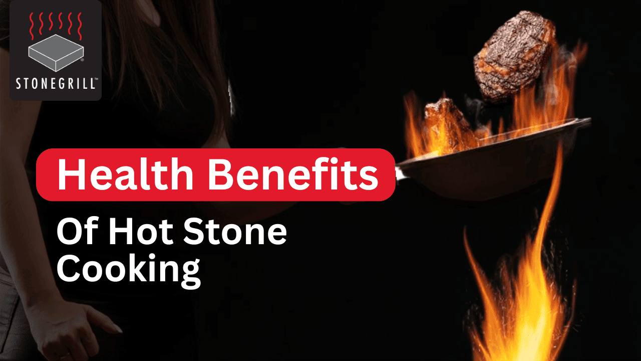 pieces of meat are searing on a hot stone with flames visible