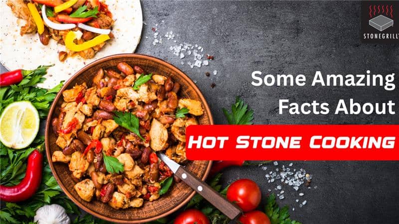 Fresh stone-cooked chicken dish served with vegetables on a dark stone surface at The Flames Galore Restaurant.